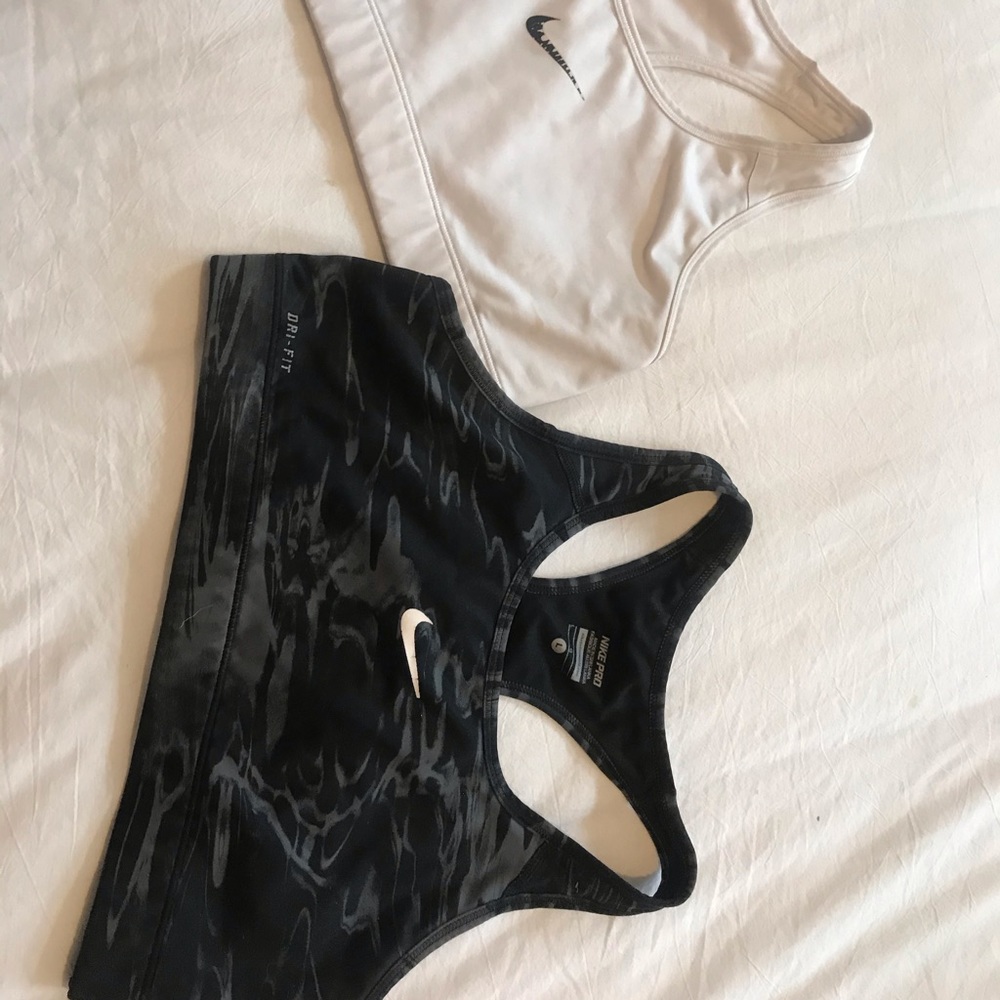 Two Sz L Nike sports bras